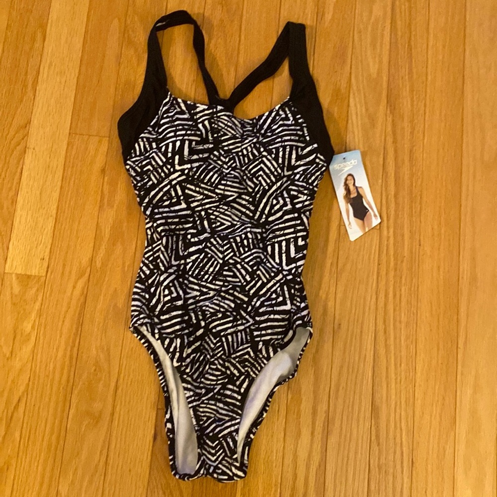 Black and white full swim suit NWT. Never worn